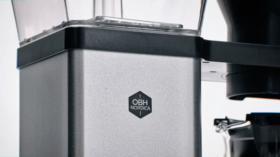 Close-up of the OBH Nordica logo on the Blooming coffee maker