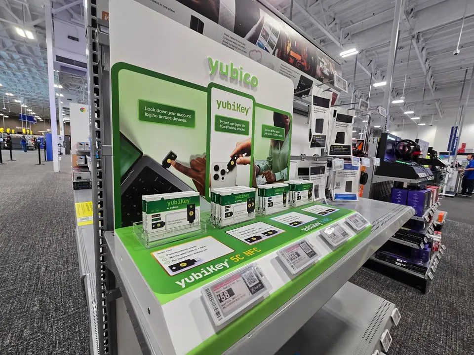 YubiKey in-store display at Best Buy with green retail packaging on the shelf