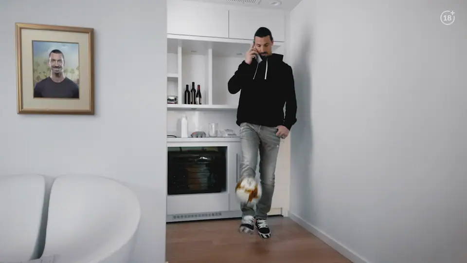 Zlatan juggles a football in his kitchen while pancakes are made